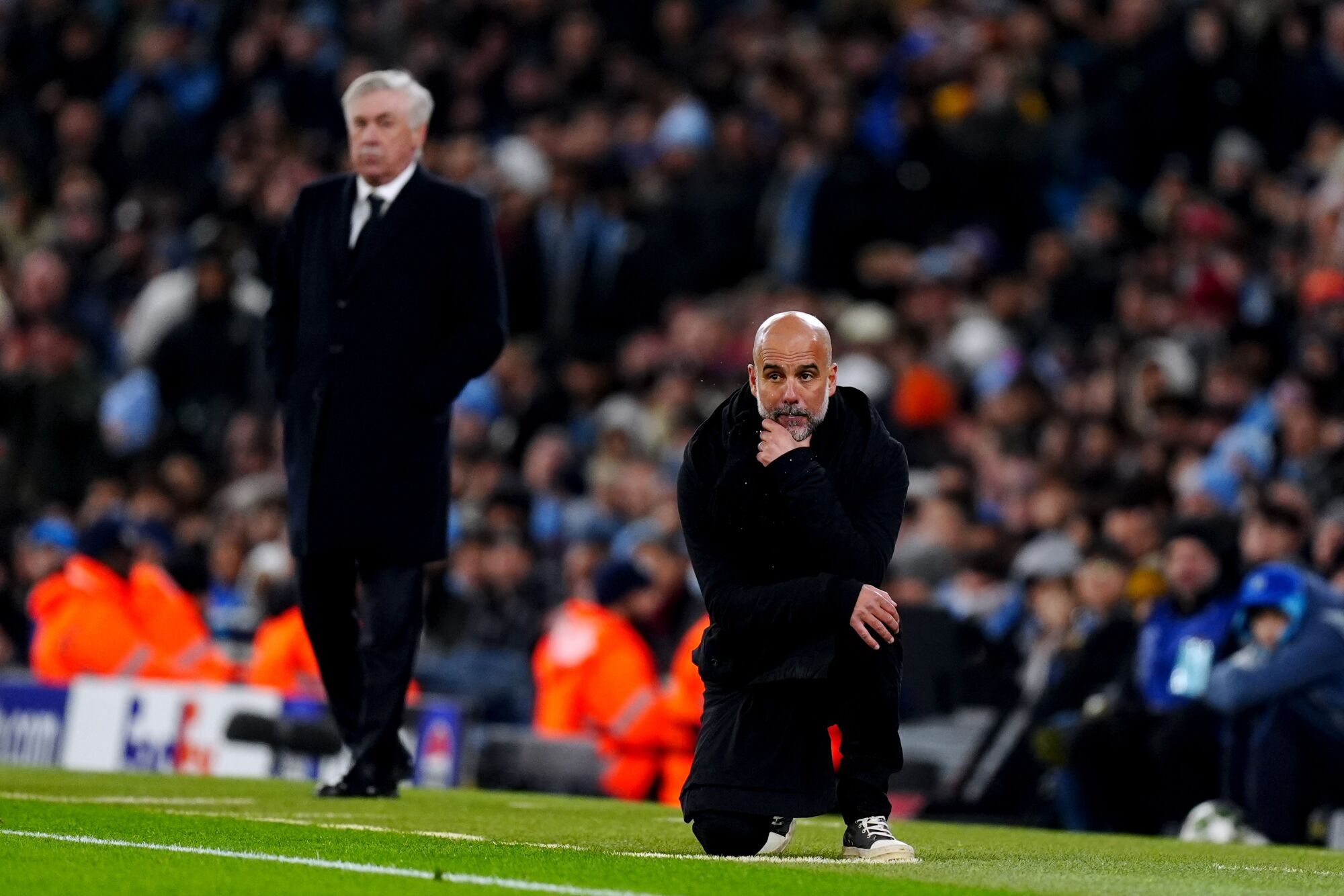 11 February 2025, United Kingdom, Manchester: Manchester City manager Pep Guardiola (R) reacts during the UEFA Champions League intermediate round first leg soccer match between Manchester City and Real Madrid at the Etihad Stadium. Photo: Mike Egerton/PA Wire/dpa 11/02/2025 ONLY FOR USE IN SPAIN. Mike Egerton/PA Wire/dpa;Sports;soccer;football;sports;UEFA Champions League - Manchester City vs Real Madrid;