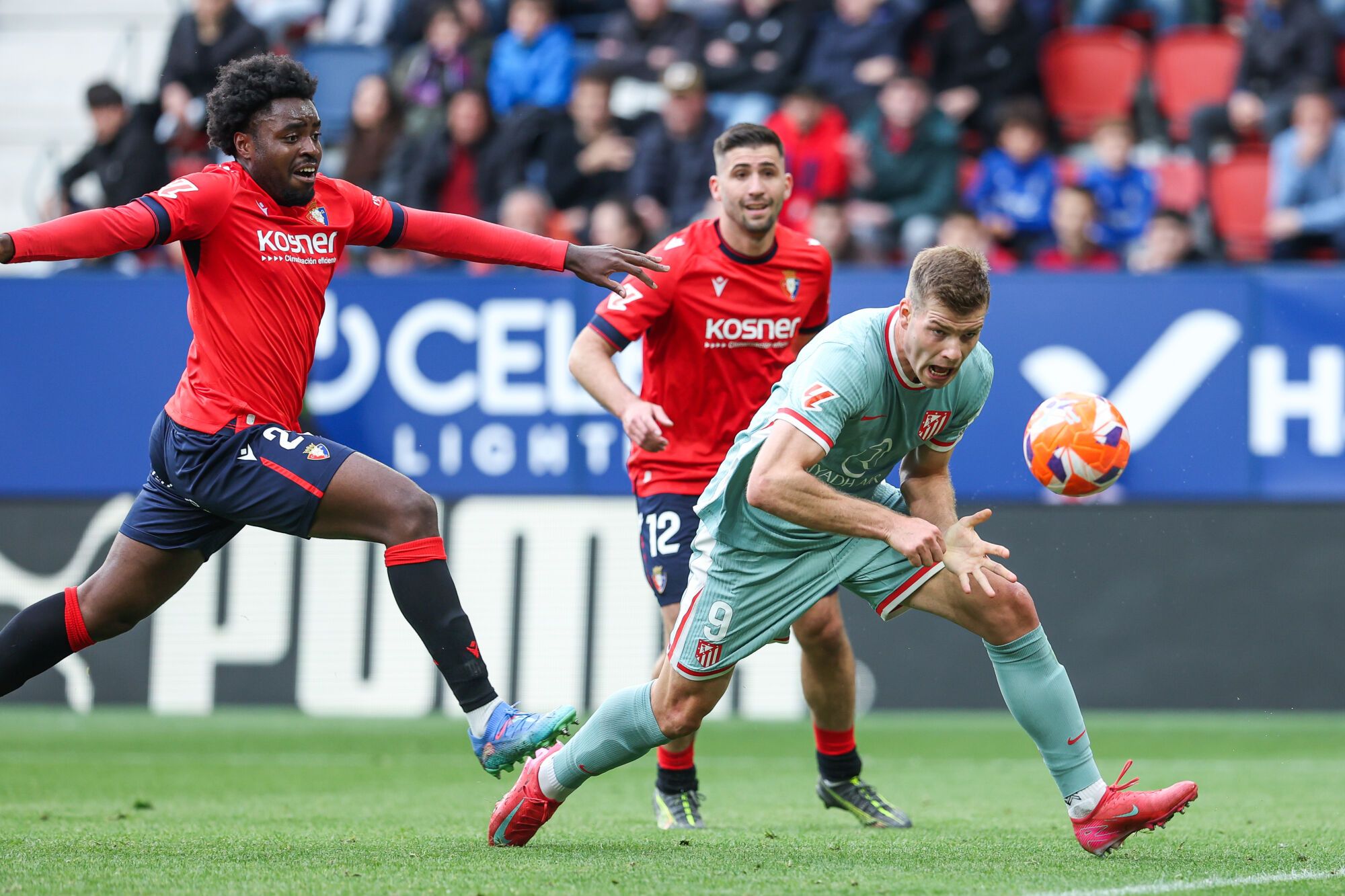 Enzo Boyomo of CA Osasuna and Alexander Sorloth of Atletico de Madrid in action during the Spanish League, LaLiga EA Sports, football match played between CA Osasuna and Atletico de Madrid at El Sadar stadium on May 15, 2025, in Pamplona, Navarra, Spain. AFP7 15/05/2025 ONLY FOR USE IN SPAIN. Irina R. Hipolito / AFP7 / Europa Press;2025;SPORT;ZSPORT;SPAIN;SOCCER;ZSOCCER;CA Osasuna v Atletico de Madrid - LaLiga EA Sports;