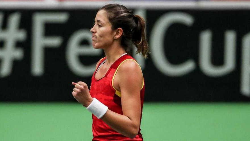 Garbiñe Muguruza celebra un punto conseguido en su partido.