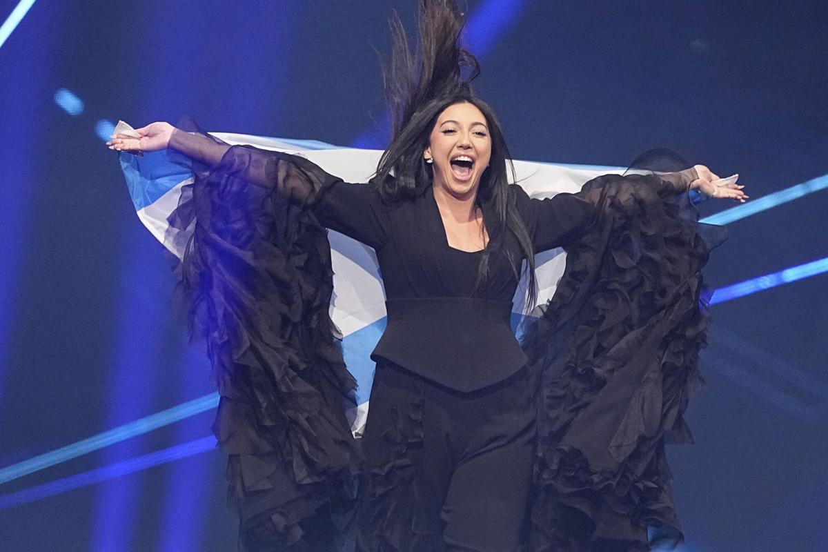 Yuval Raphael from Israel holds her countries flag onstage during the Grand Final of the 69th Eurovision Song Contest, in Basel, Switzerland, Saturday, May 17, 2025. (AP Photo/Martin Meissner) Associated Press/LaPresse. EDITORIAL USE ONLY/ONLY ITALY AND SPAIN