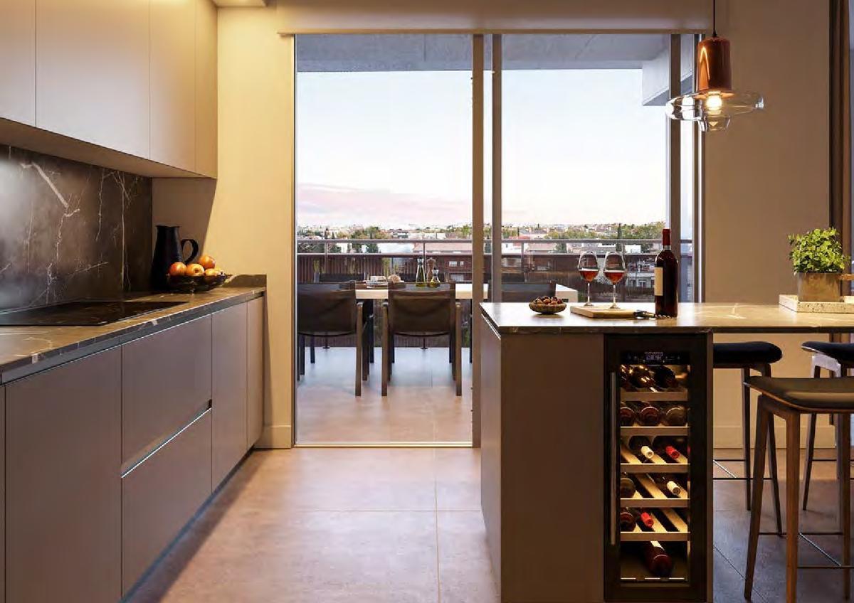 En las cocinas de Unique Residencia se han cuidado todos los detalles y cuentan, entre otros equipamientos, con islas y vinoteca.