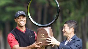 Tiger Woods holds a winning trophy as he celebrates to win the Zozo Championship, a PGA Tour event, at Narashino Country Club in Inzai, Chiba Prefecture, east of Tokyo, Japan October 28, 2019, in this photo released by Kyodo. Mandatory credit Kyodo/via REUTERS ATTENTION EDITORS - THIS IMAGE WAS PROVIDED BY A THIRD PARTY. MANDATORY CREDIT. JAPAN OUT. NO COMMERCIAL OR EDITORIAL SALES IN JAPAN. THIS IMAGE WAS PROCESSED BY REUTERS TO ENHANCE QUALITY, AN UNPROCESSED VERSION HAS BEEN PROVIDED SEPARATELY.