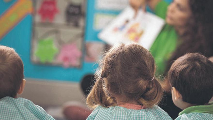 Menores reciben clase tras el confinamiento en la escuela infantil Higo Pico, en La Laguna.