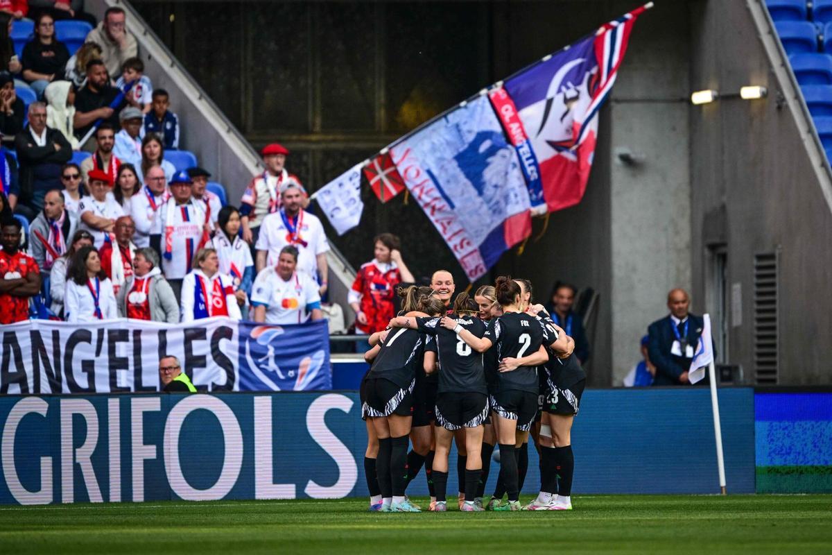 Arsenal's players celebrate after scoring a goal during the UEFA Women's Champions League semi-final second leg football match between Lyon and Arsenal at the Groupama Stadium in Decines-Charpieu, central-eastern France on April 27, 2025. (Photo by OLIVIER CHASSIGNOLE / AFP)