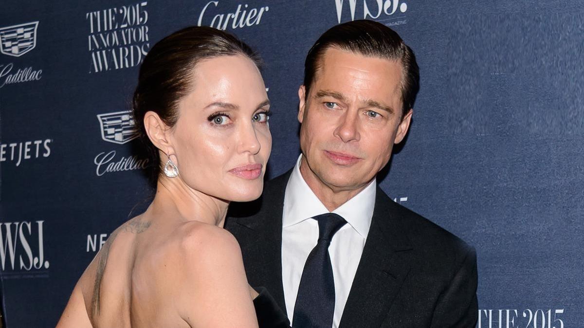 lmmarco39626427 actors angelina jolie and brad pitt attending the wsj magazi170810161818