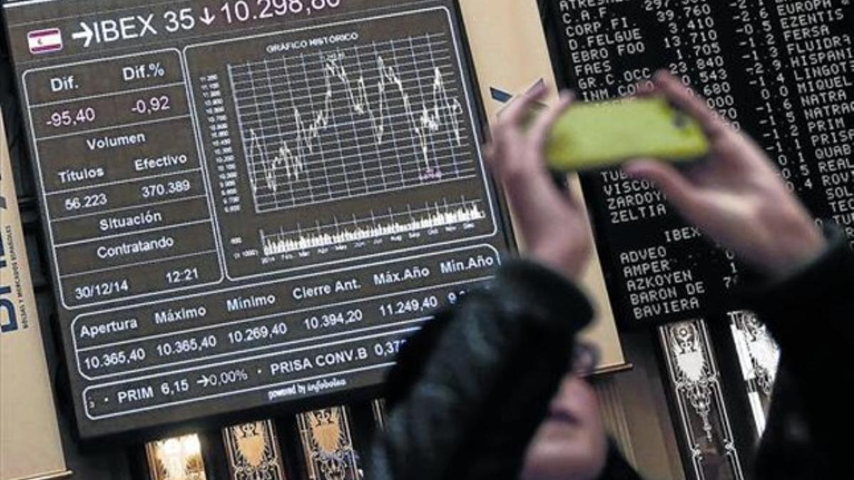 Panel de datos en la Bolsa de Madrid el pasado 30 de diciembre.