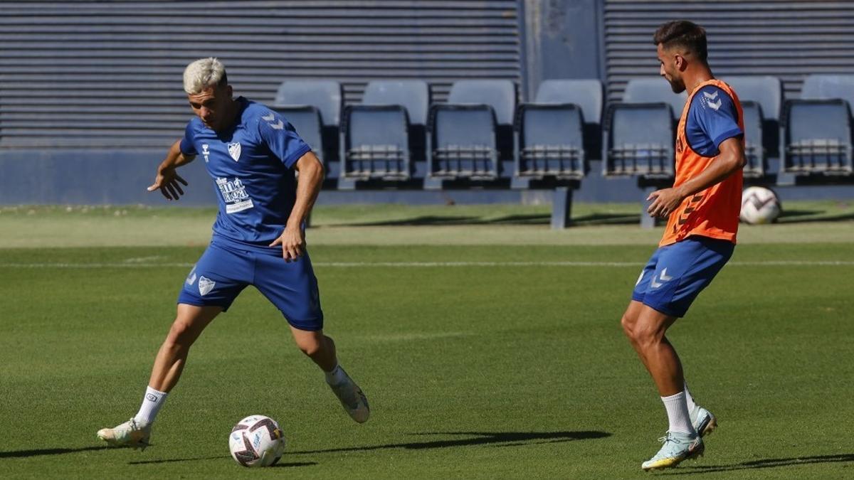 Gallar y Luis Muñoz, durante un entrenamiento.