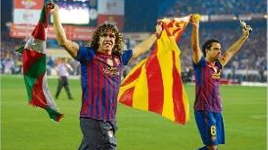 Carles Puyol i Xavi Hernández, a la final de Copa del Rei del 2012.