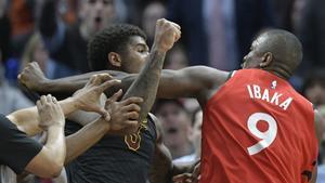 Mar 11, 2019; Cleveland, OH, USA; Cleveland Cavaliers forward Marquese Chriss (3) and Toronto Raptors center Serge Ibaka (9) throw punches in the third quarter at Quicken Loans Arena. Both players were ejected. Mandatory Credit: David Richard-USA TODAY Sports