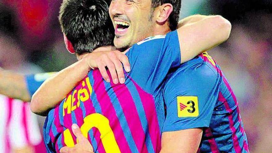 Villa celebra su gol con Messi, el primero del Barcelona al Atlético de Madrid.