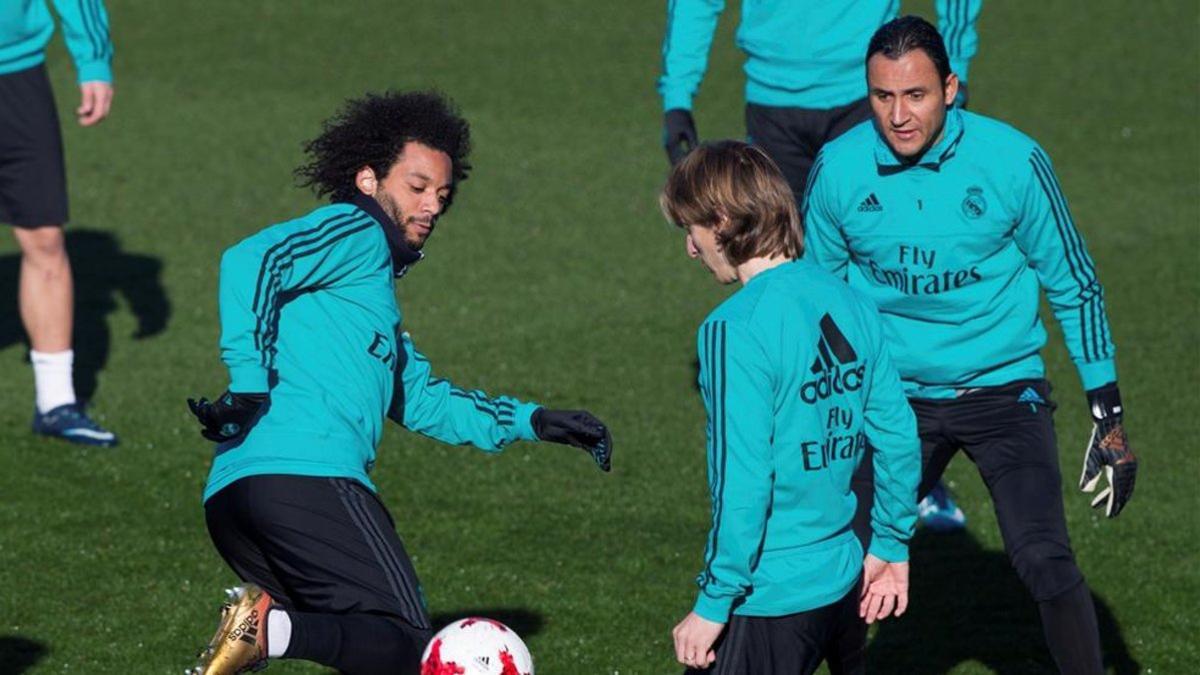 Marcelo, Modric y Keylor, en un entrenamiento