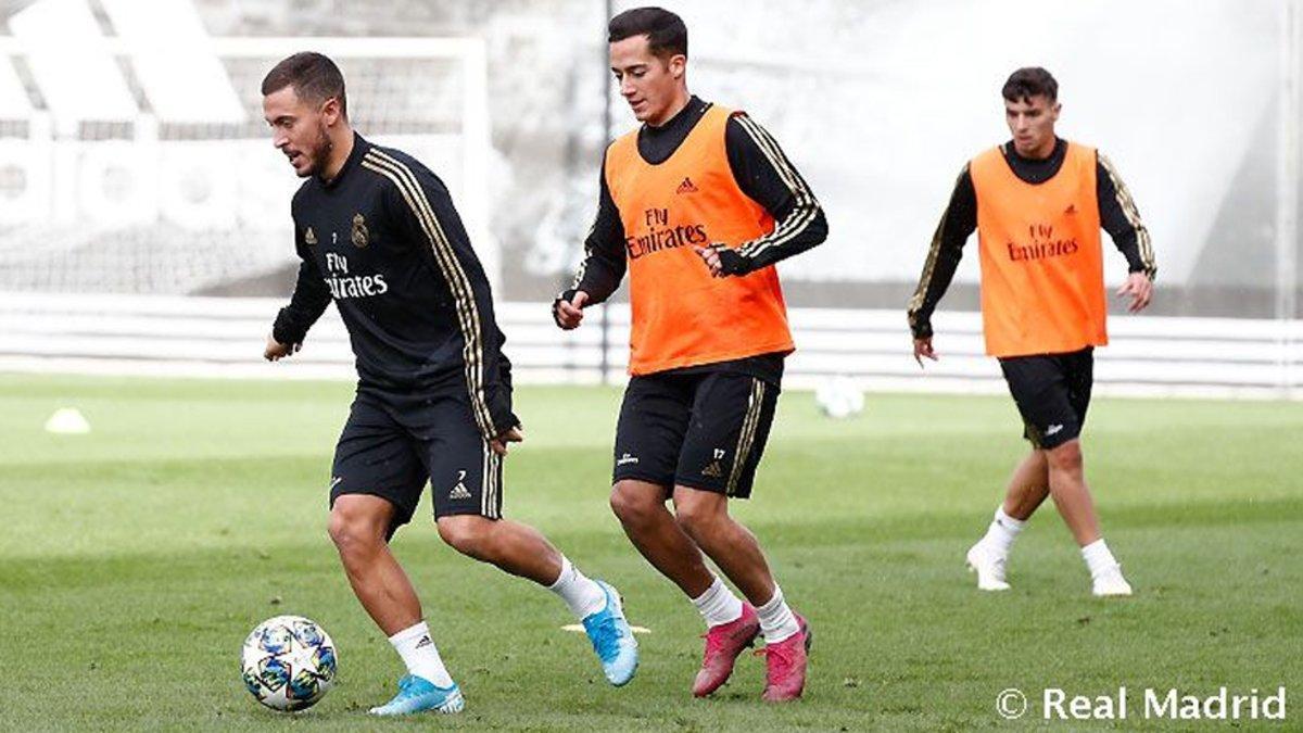 Eden Hazard y Lucas Vázquez durante el entrenamiento del Real Madrid de este domingo
