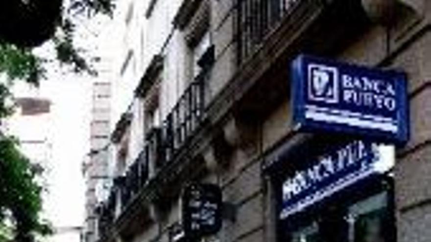 Caja Duero quiere comprar la red de oficinas en la región de Banca Pueyo -  El Periódico Extremadura