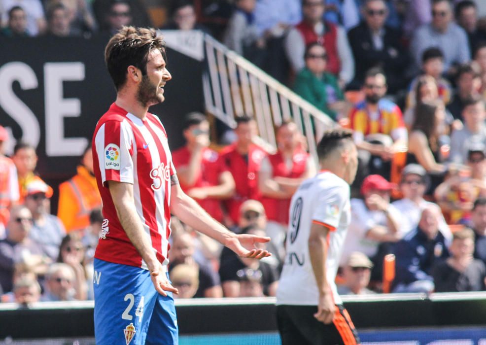 El partido entre el Valencia y el Sporting, en imágenes