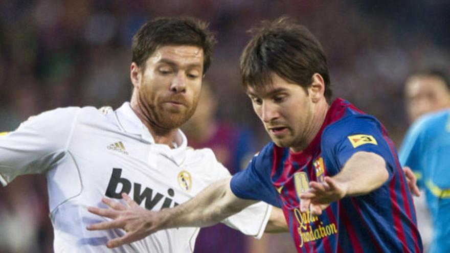 Messi y XAbi Alonso.