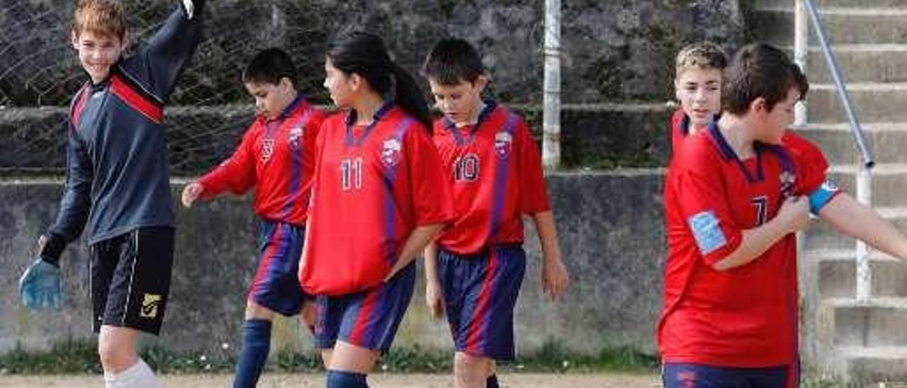 Los jugadores el pasado sábado, antes de disputar su partido ante el Masaveu.