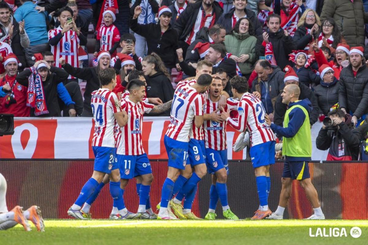 Griezmann, abrazado por su compañeros
