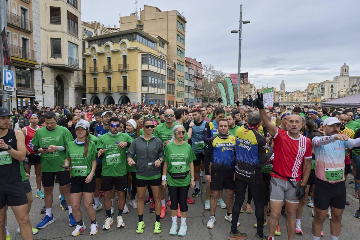 La XII Tradeinn Cursa Girona en Marxa Contra el Càncer en imatges