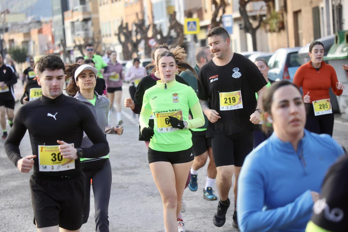 Las imágenes de la carrera popular solidaria en el barrio de El Progreso