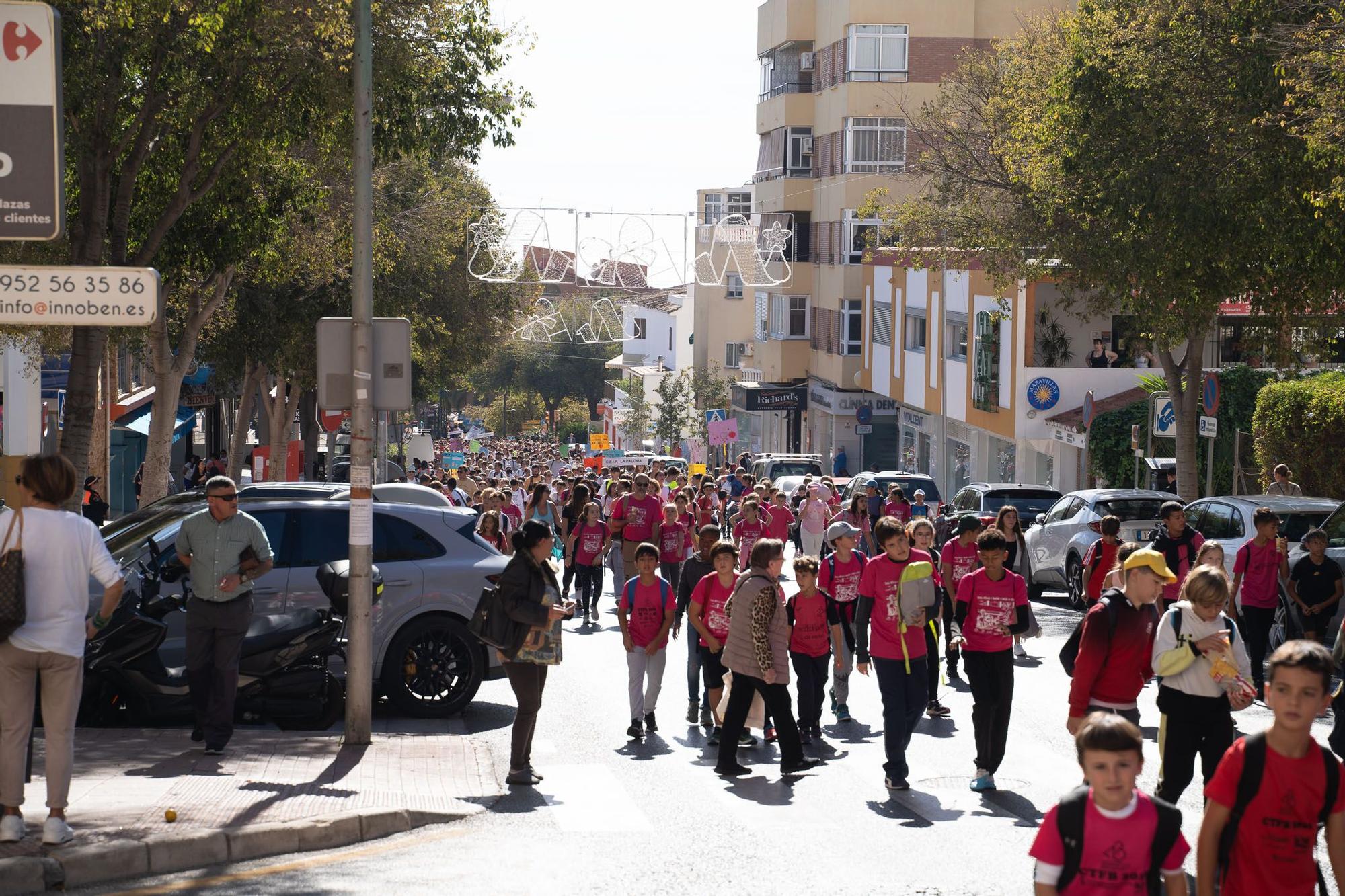 La carrera de Benalmádena 'Caminando por un reto', en imágenes