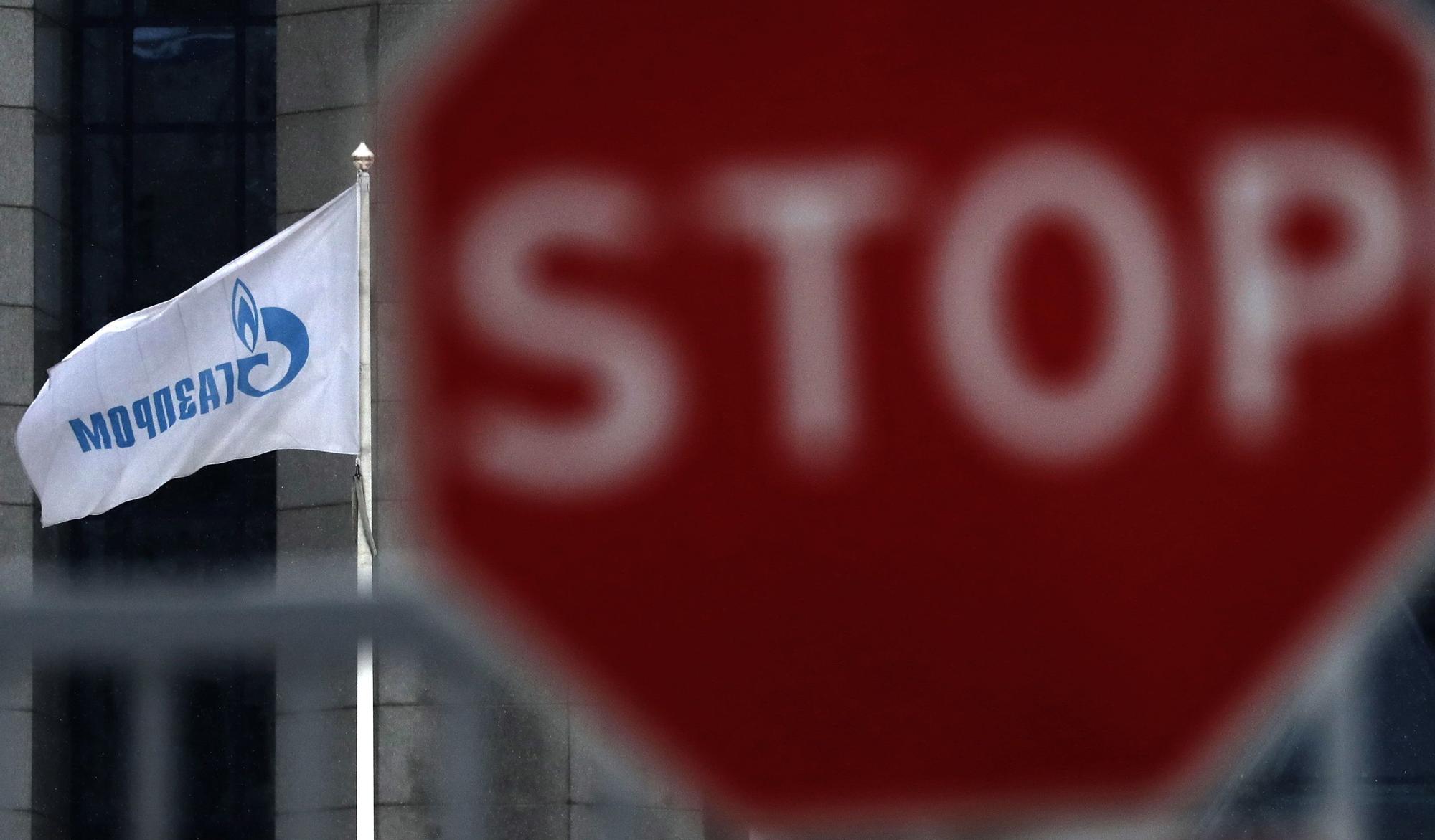 A flag of the Russian multinational energy corporation Gazprom waves outside of Moscow office building of the company in Moscow, Russia, 03 January 2021.