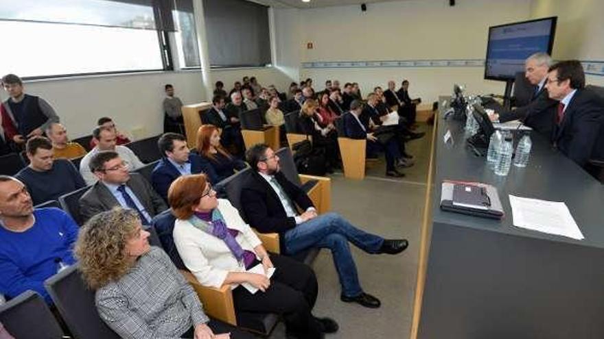 Miguel Temboury y Francisco Conde, con el público asistente. // G.S.