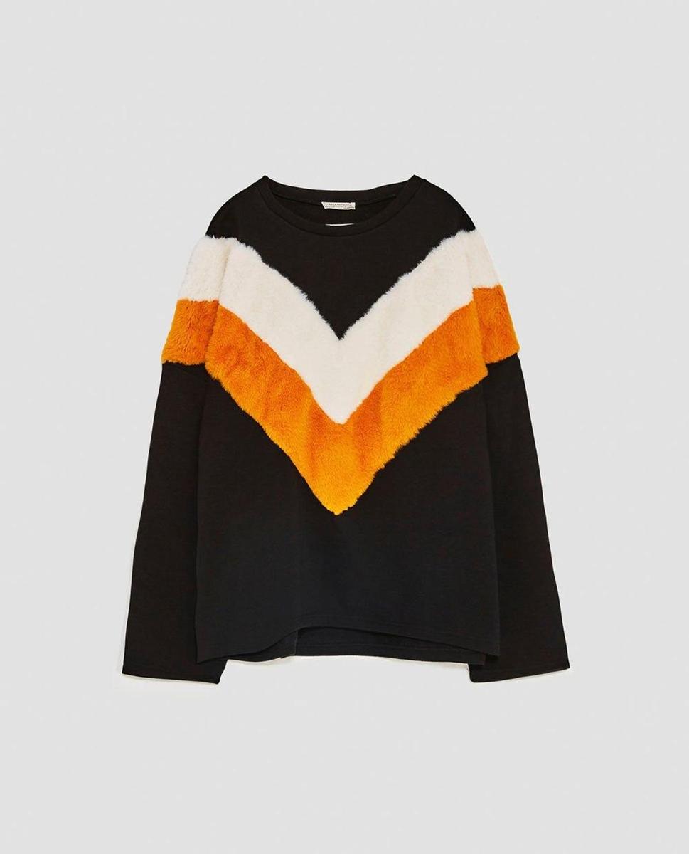 Sudadera bicolor de Zara (Precio: 22,95 euros)