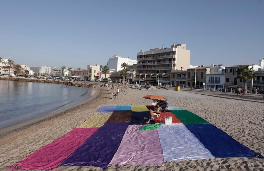 15 Handtücher am Strand