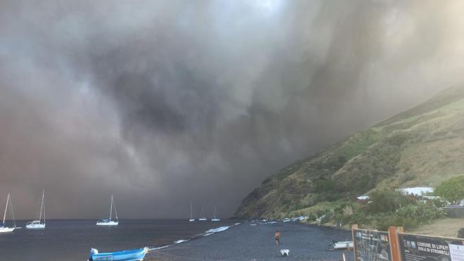 An intense cloud of lava ash and pyroclate material rises on Stromboli from the Sciara del Fuoco
