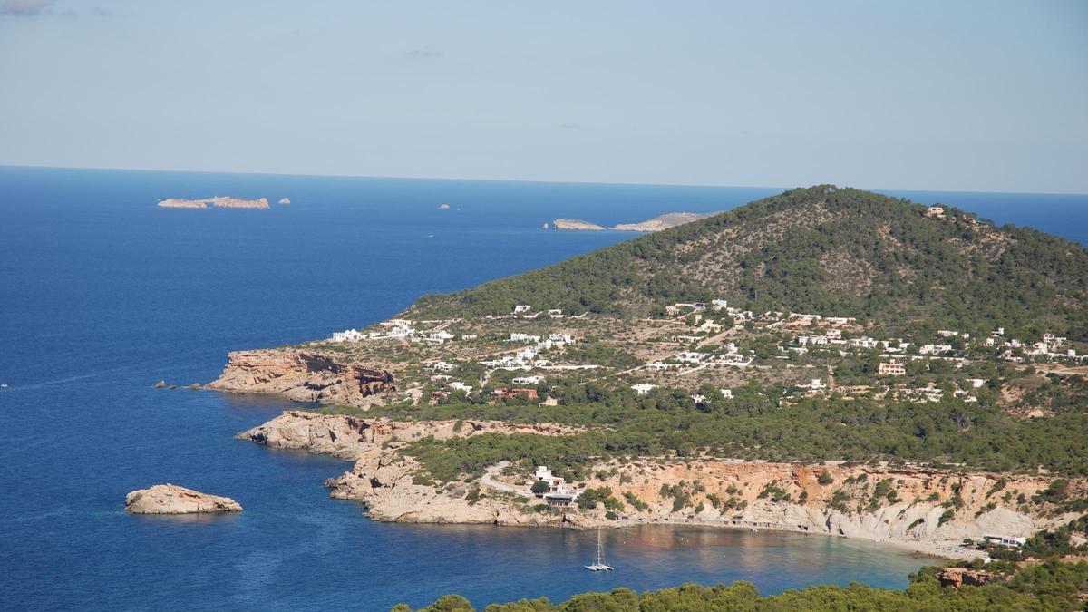 Houses scattered along the coast in Ibiza.