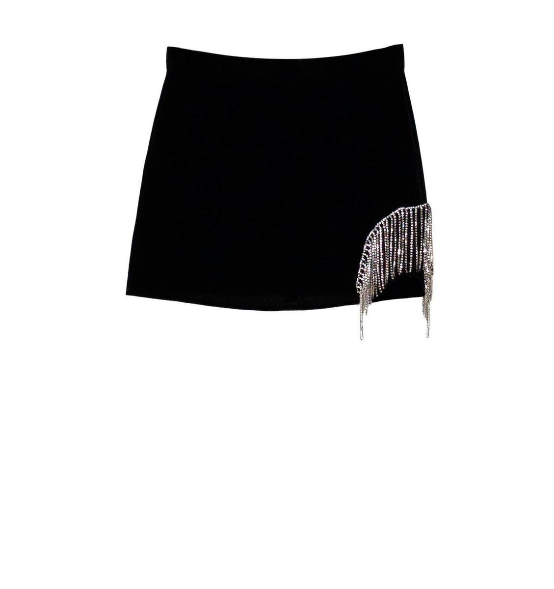 Minifalda con flecos de Bershka (25,99 euros)
