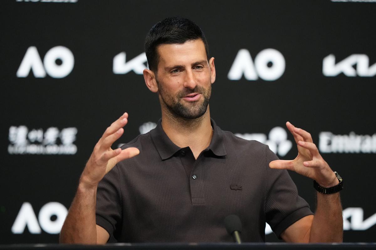 Novak Djokovic of Serbia gestures during a press conference ahead of the Australian Open tennis championship in Melbourne, Australia, Saturday, Jan. 17, 2026. (AP Photo/Aaron Favila)
