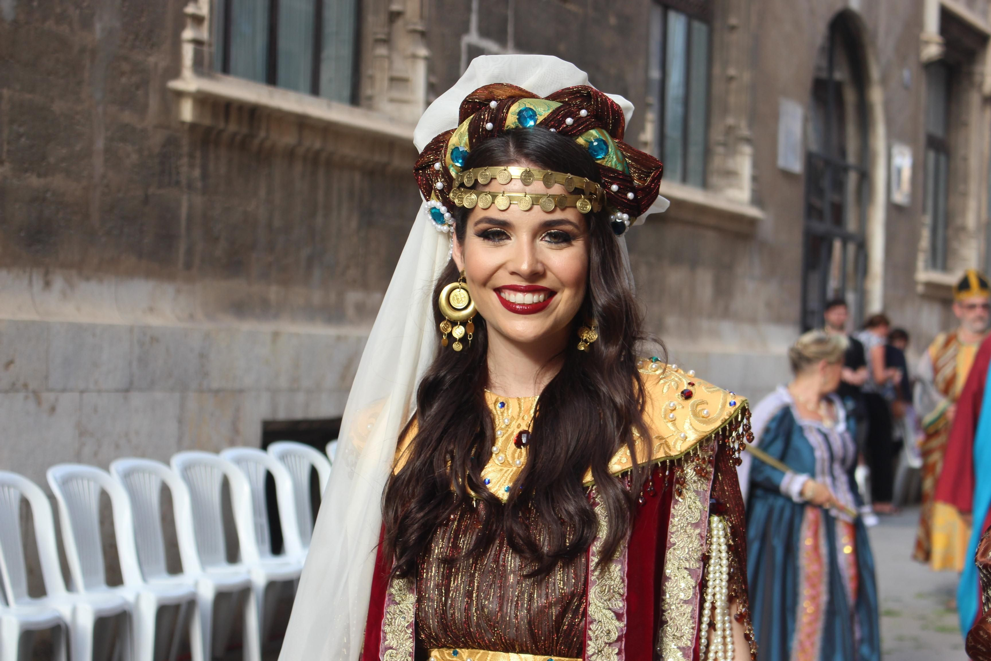 Carmen, Nerea, la reina de Saba y el Ángel del Desierto, en la procesión del Corpus