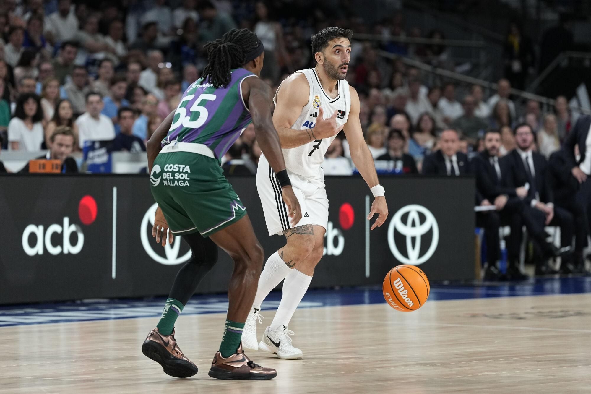 Facundo Campazzo of Real Madrid and Kendrick Perry of Unicaja in action during the Spanish League, Semi-Final second leg of Liga ACB Endesa, basketball match played between Real Madrid and Unicaja Baloncesto at Movistar Arena pavilion on June 13, 2025 in Madrid, Spain. AFP7 13/06/2025 ONLY FOR USE IN SPAIN. Oscar J. Barroso / AFP7 / Europa Press;2025;BASKET;SPAIN;SPORT;ZBASKET;ZSPORT;Real Madrid v Unicaja Baloncesto - Liga ACB Endesa Semi-Final Second Leg;