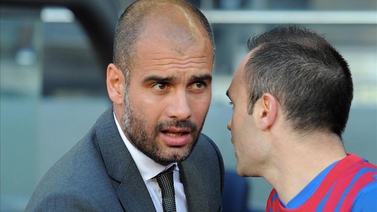 Iniesta con Pep Guardiola