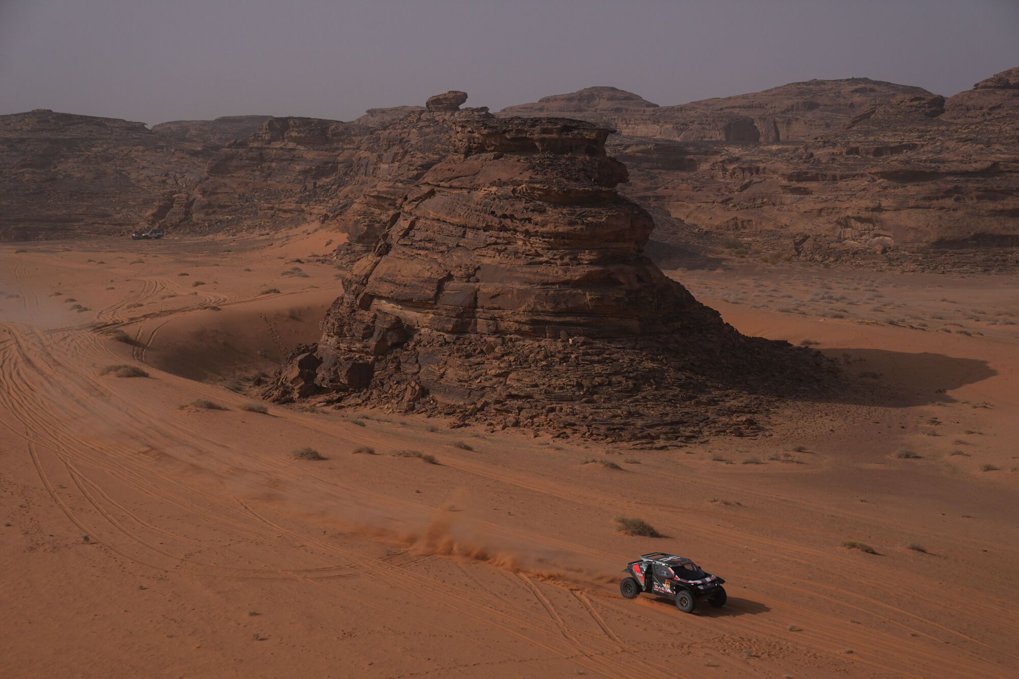 Driver Sebastien Loeb and co-driver Edouard Boulanger compete during the third stage of the Dakar Rally with a start and finish in Alula, Saudi Arabia, Tuesday, Jan. 6, 2026. (AP Photo/Thibault Camus)