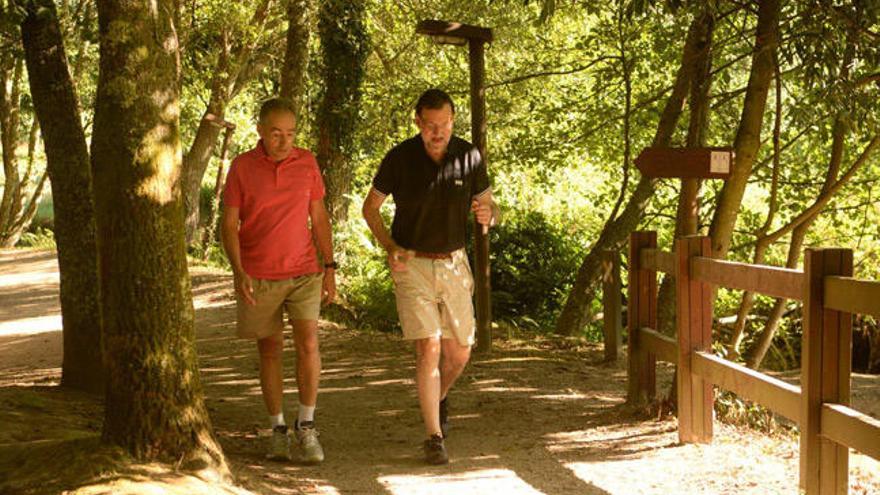 Rajoy, junto a José Benito Suárez, esta mañana. // Noé Parga