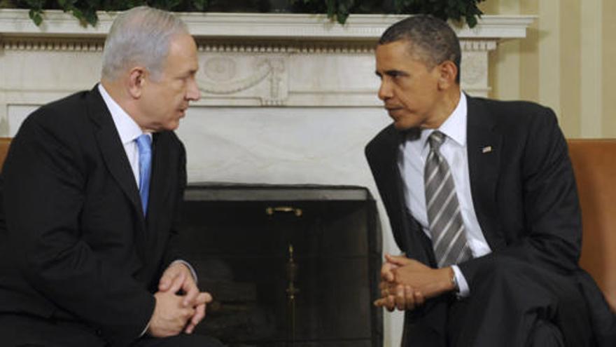 Netanyahu y Obama.-