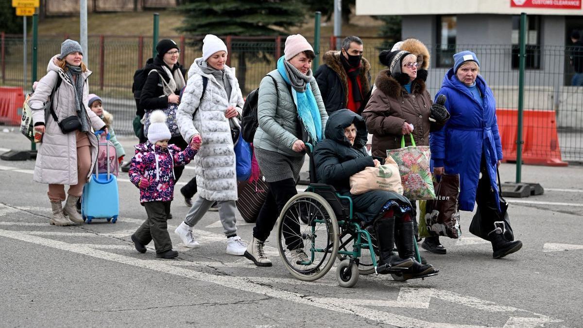 Refugiados de la guerra de Ucrania en el cruce fronterizo polaco-ucraniano en Korczowa, Polonia 10 de marzo de 2022.