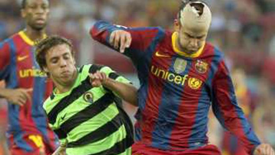 Kiko y Piqué en el Camp Nou.