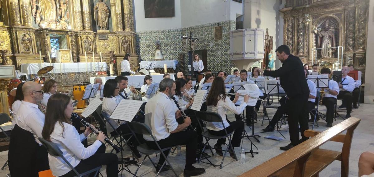 La Banda de Muel  ofreció una emocionante actuación en la iglesia de la localidad.  | SERVICIO ESPECIAL