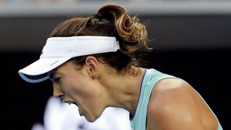 Muguruza festeja un punto ganador en su partido de octavos ante Sorana Cirstea. // Made Nagi