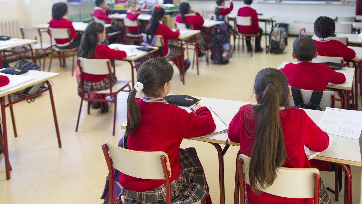 Alumnos en un colegio antes de la pandemia.