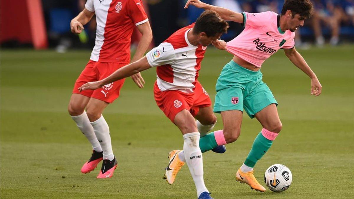 Bernardo junto a Trincao, en el partido amistoso entre Barça y Girona.