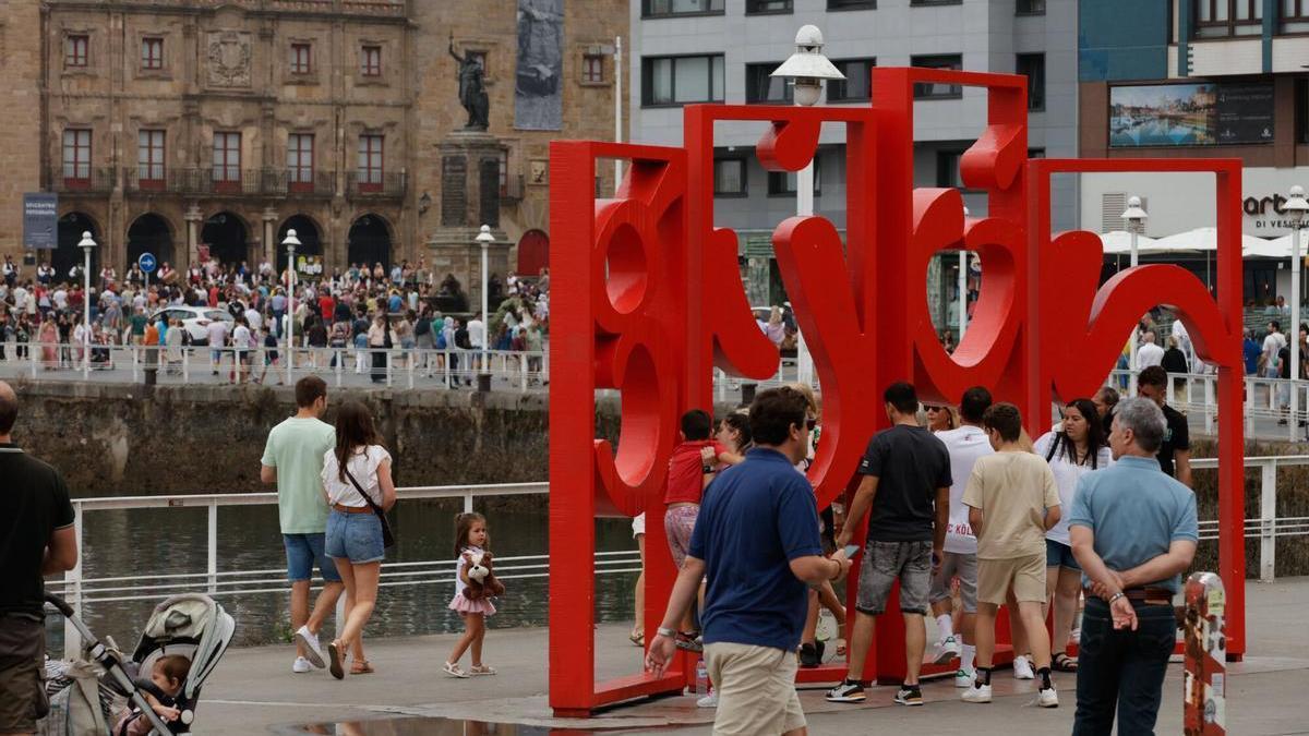 Turistas en Gijón.