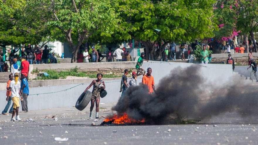 Protestas populares en Puerto Príncipe, la capital haitiana.  // Efe