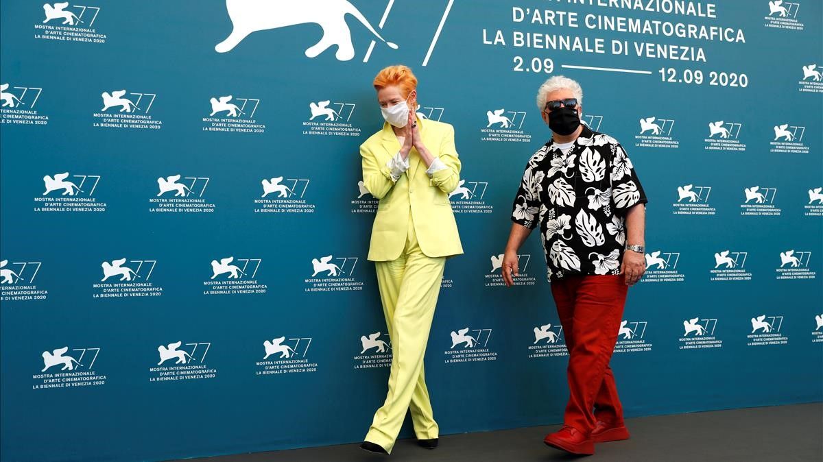 The 77th Venice Film Festival - Photo call for the film  The Human Voice  out of competition - Venice  Italy  September 3  2020 - Director Pedro Almodovar and Actor Tilda Swinton wear protective masks  REUTERS Yara Nardi