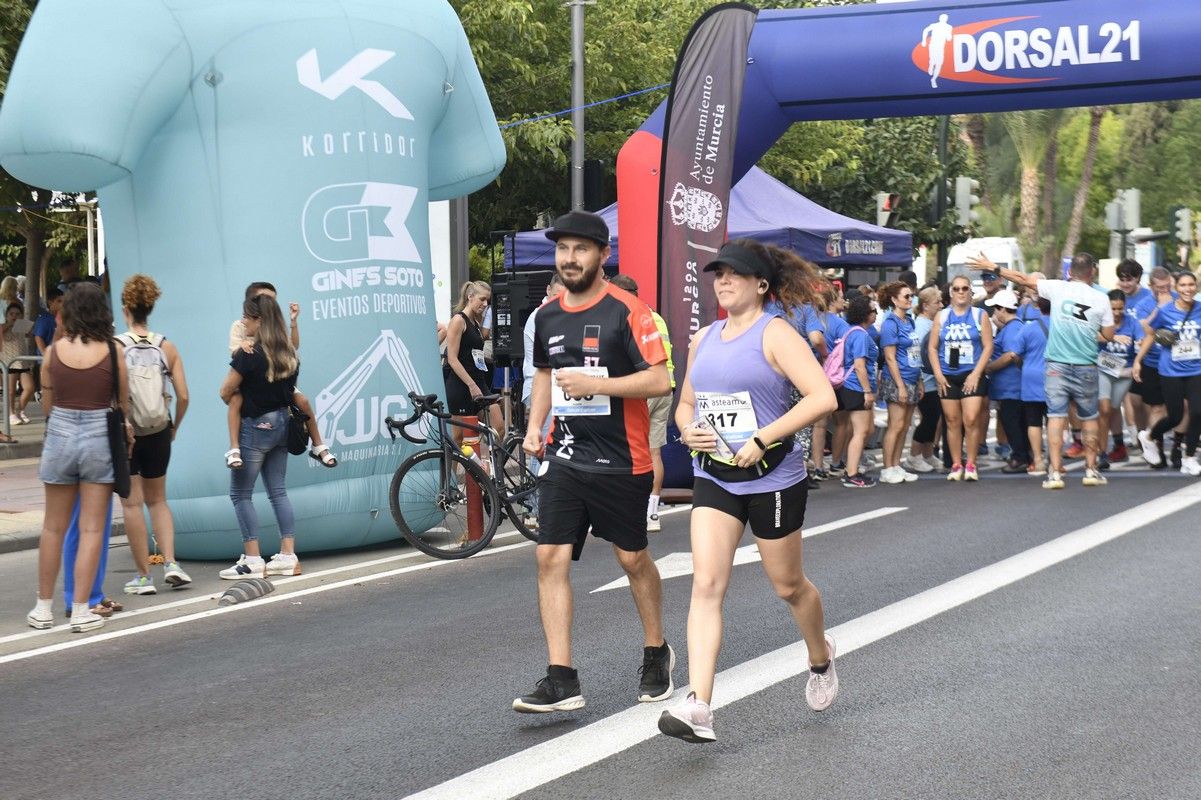 La carrera y marcha Solidaria Asteamur, en imágenes