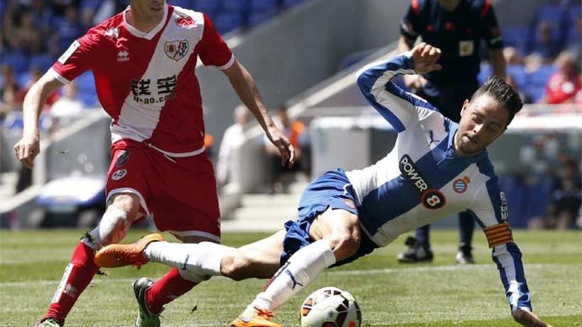 Sergio García con Raúl Baena durante el Espanyol-Rayo de la Liga BBVA 2014-15