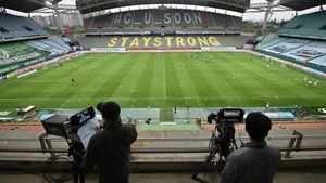marcosl53360642 topshot   cameramen take footages while football players war200509162140